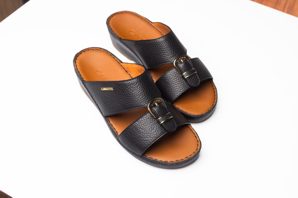 7070 جلد الادريا الطبيعي اللون أسود (توكه ذهبية + شعار ذهبي)